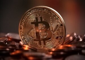 cine a inventat moneda bitcoin