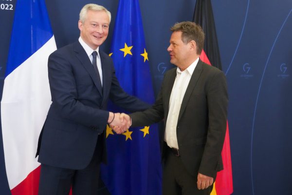 French Finance Minister Bruno Le Maire, left, arrives for talks with German Economy and Climate Minister Robert Habeck, right, in Berlin, Germany, Thursday, March 31, 2022. (AP Photo/Markus Schreiber, Pool)